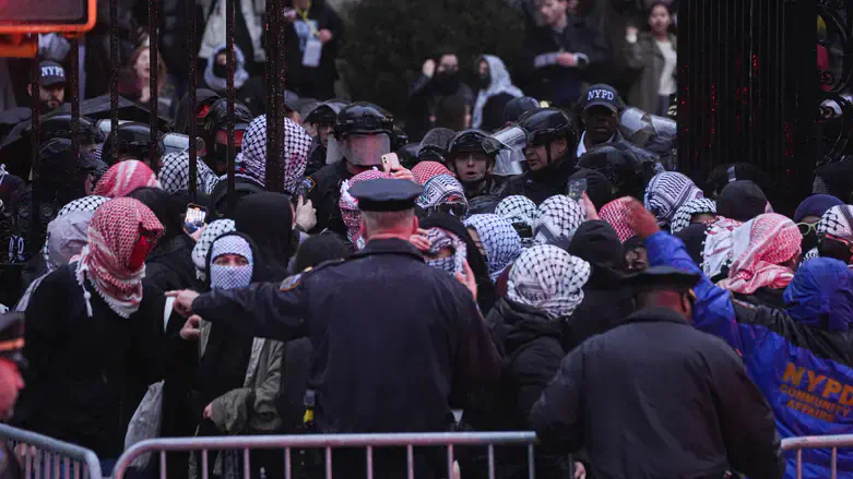 NYPD officers clear pro-Palestinian demonstrators from the Barnard library on Wednesday.