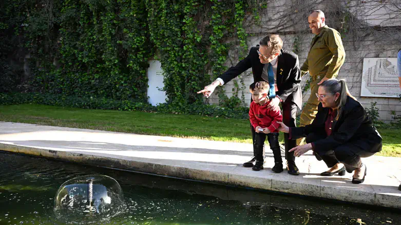 The Herzogs with the reservist and one of his children