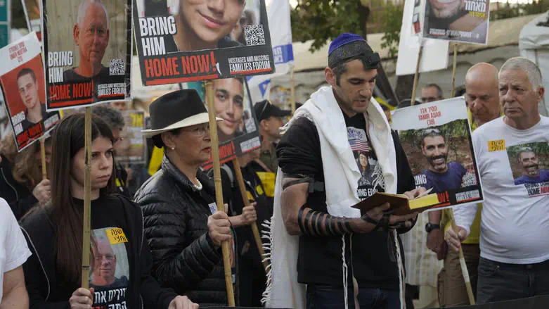 Edan Alexander's family at the early-morning demonstration