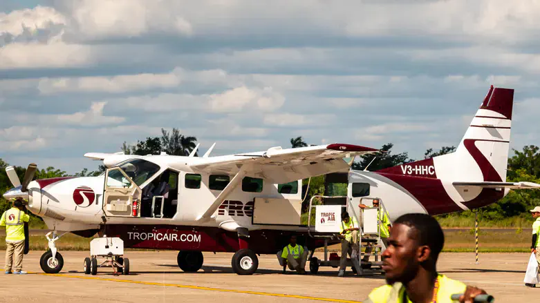 Tropic Air plane getting ready for passengers