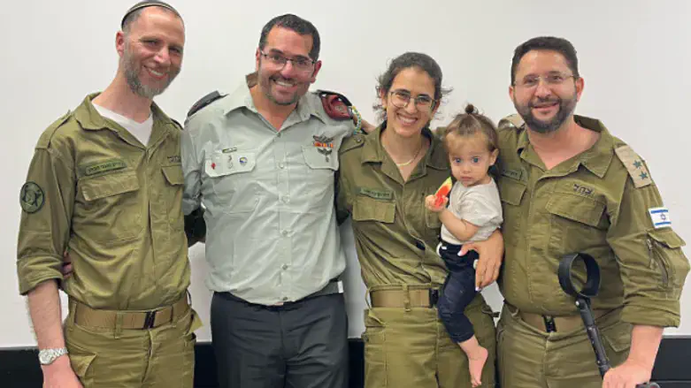 Aharon Karov (second from left)