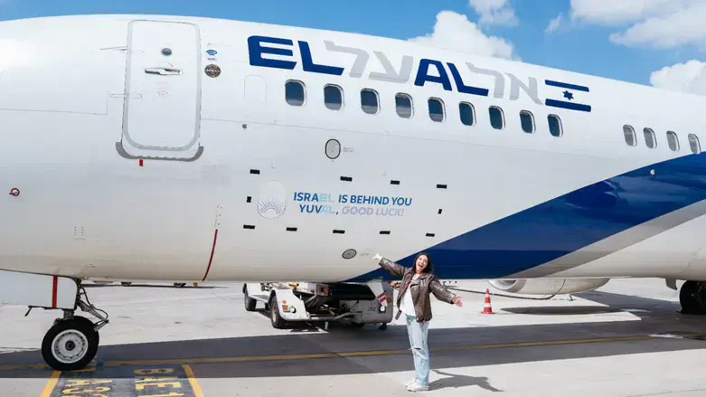 Yuval Refael near El Al plane