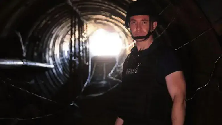 Murray walks through a Hamas tunnel in Gaza.