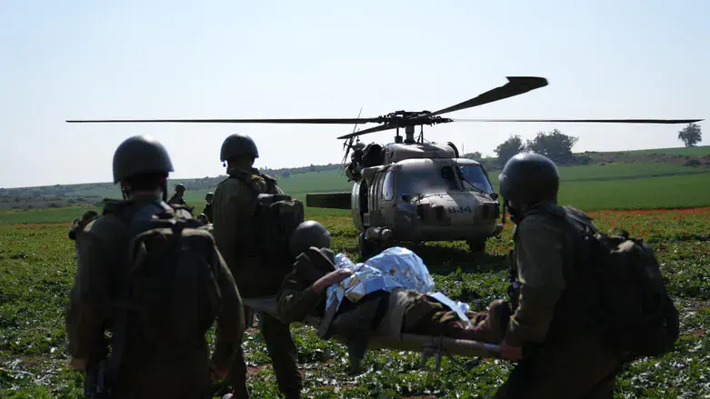 Evacuation of injured soldiers under fire