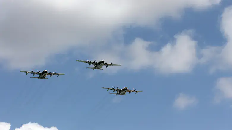 three C-130 Hercules aircraft (stock)