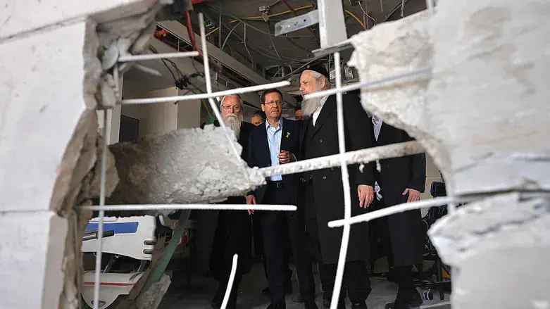 Herzog visits site of missile strike