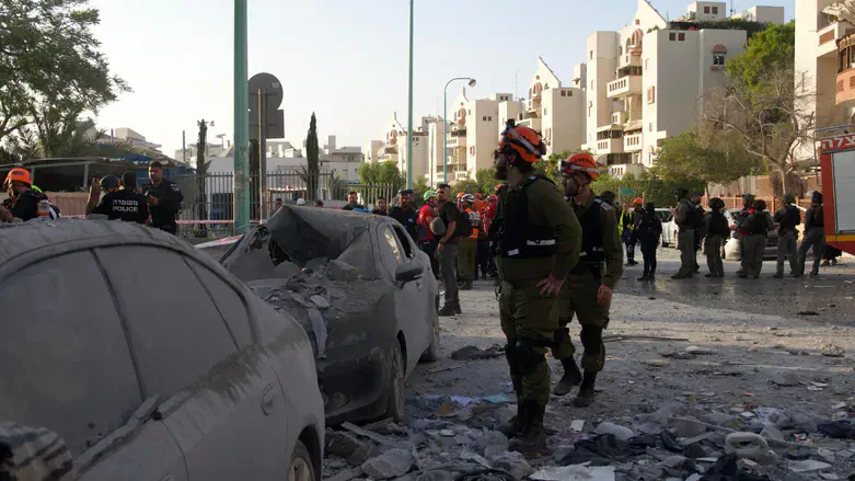 The scene of a missile strike in Be'er Sheva on Tuesday morning