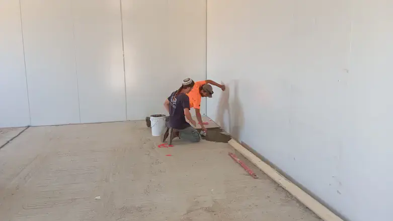 The Kolta family prepare the house