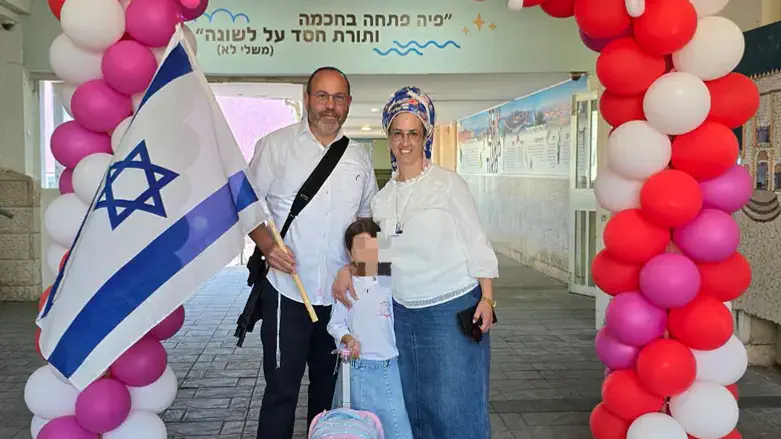 Tzvika and Efrat Mor with their daughter Oria