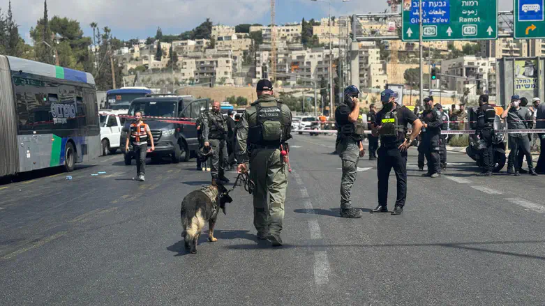 Security forces at the scene of the Ramot Junction shooting attack