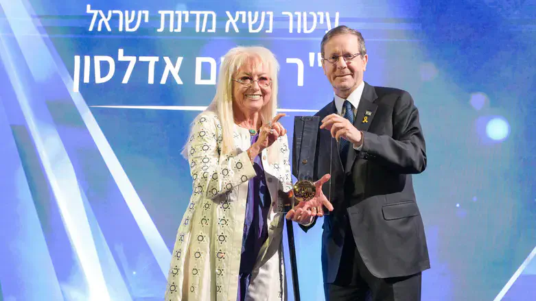 Herzog gives Medal of Honor to Miriam Adelson