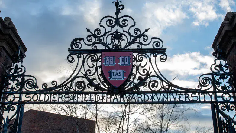Harvard University's "Veritas" shield is seen on a gate on Feb. 17, 2024.