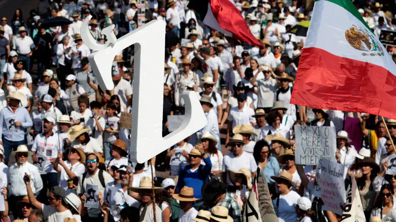 Demonstrators attend the "For Peace" march in Guadalajara, Mexico, on Nov. 15, 2025.