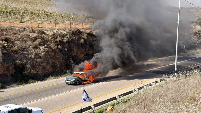Palestinian Authority vehicle in flames on Route 60