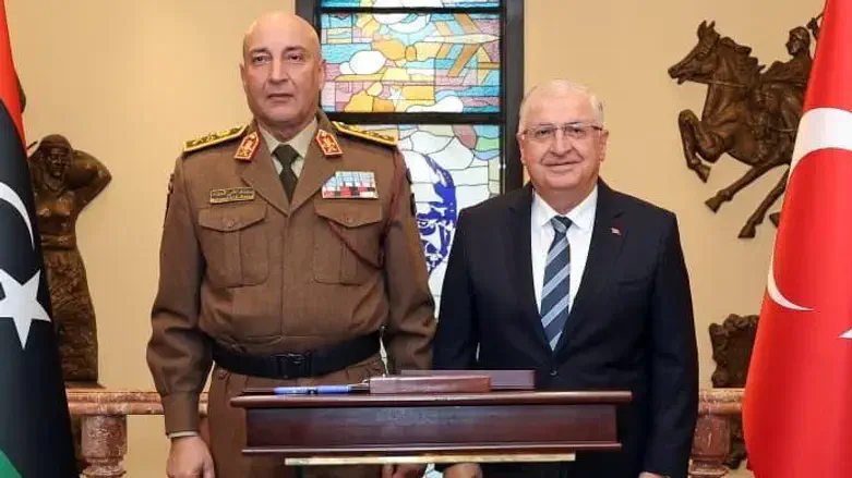 Western Libyan Chief of Staff Mohammed al-Haddad (L) with Turkish Defense Minister