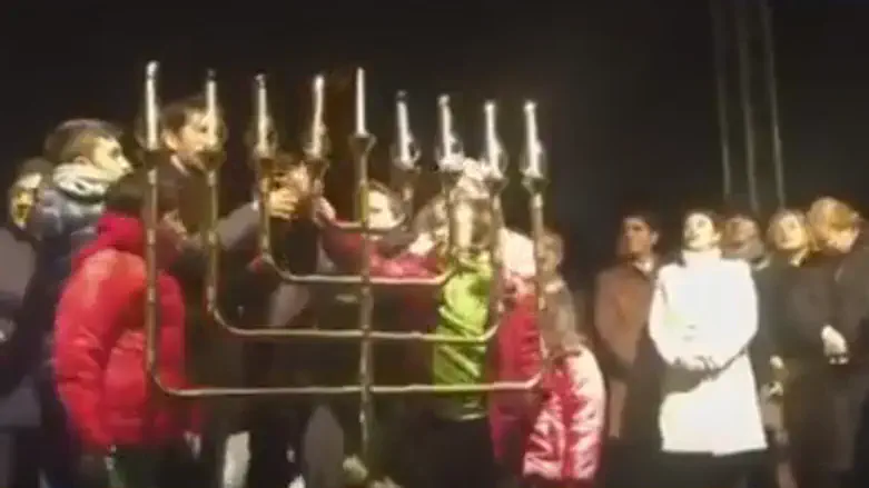 screenshot of Turkish Jews lighting menorah