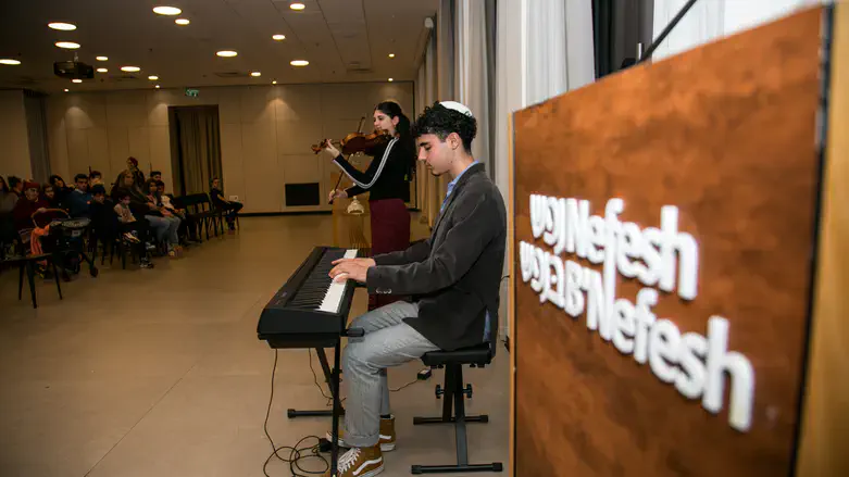 Two of the winners perform