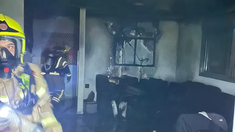 Firefighters operating at the scene of the fire