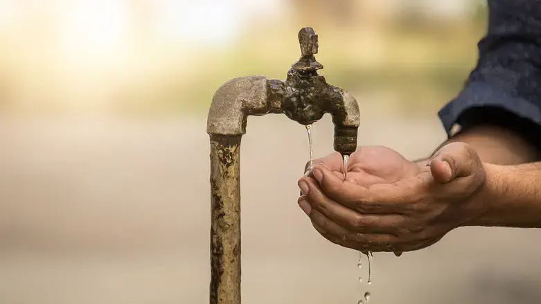 Cupped Hands under low pressure water