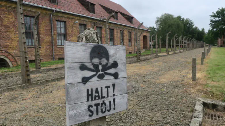 A warning sign at Auschwitz in 2018