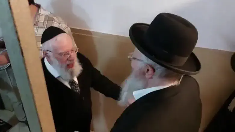 Rabbis Shapira and Eliyahu find themselves in the same  bomb shelter - and dance
