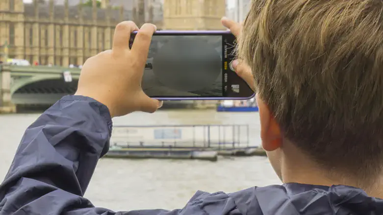 Boy photographer (illustrative)