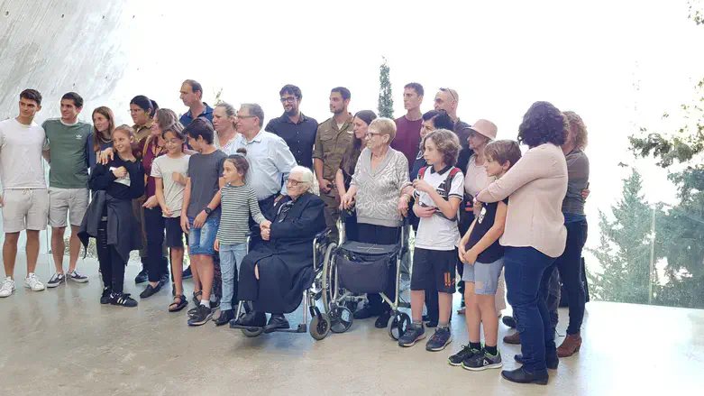 Rescuer with survivors and their descendants