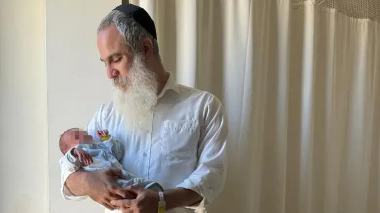 Rabbi Liraz Zeira with his newborn son