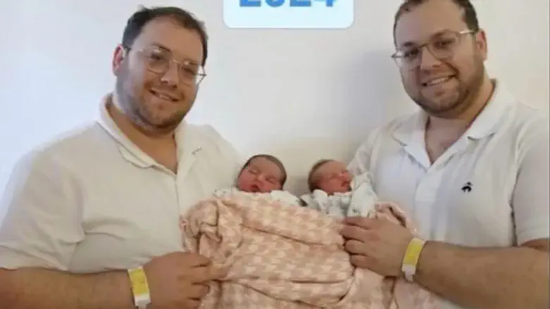 The Mizrahi twins with their infants