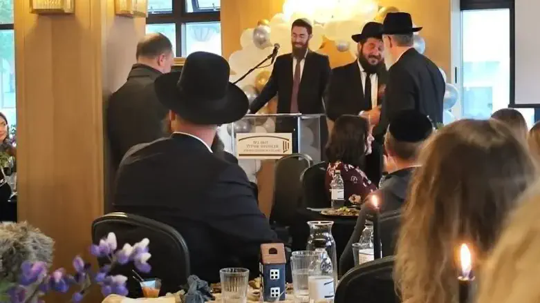 Rabbi Avraham Feldman speaks at the Jewish center's dedication in Reykjavik, July 2026.