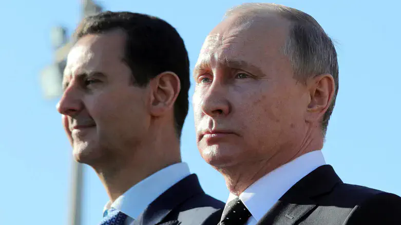 Assad, left, and Russian president Putin, right