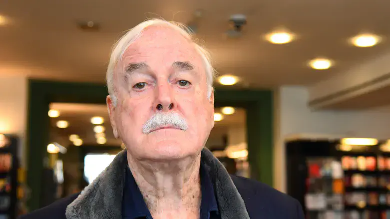John Cleese poses for a picture