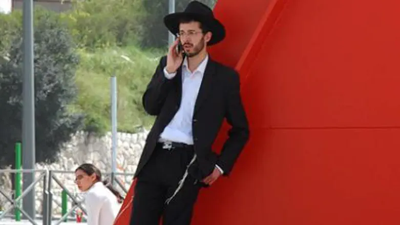 Man talks on cell phone