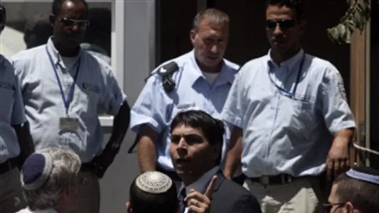 Danon with police escort.