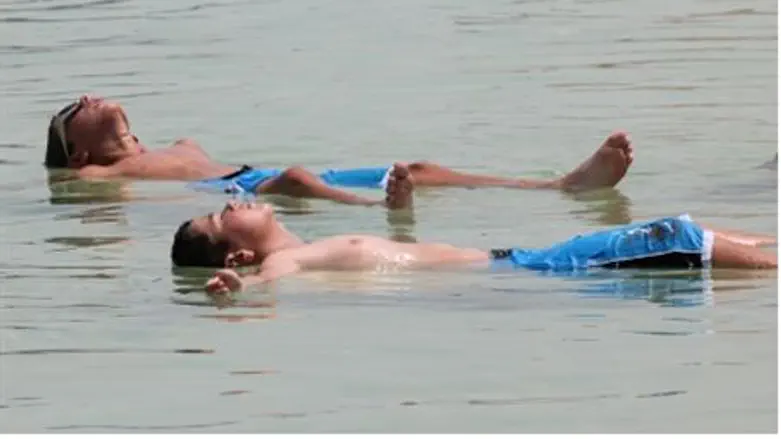 Floating in the Dead Sea