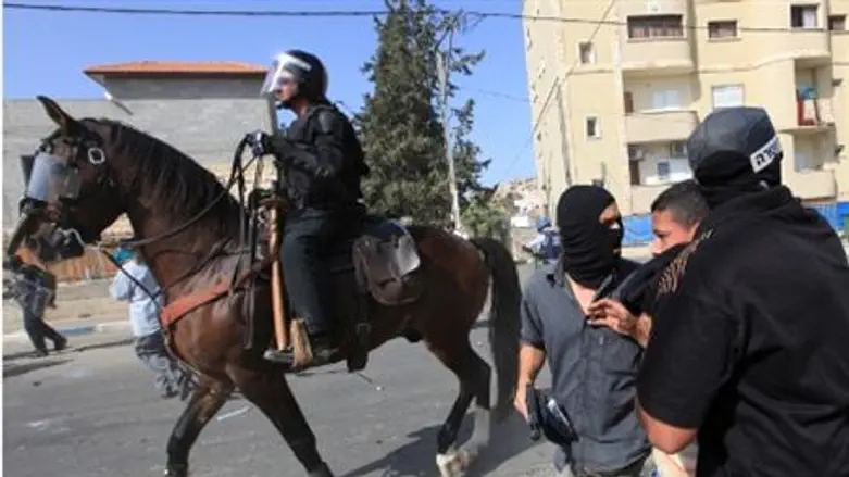 Mounted police disperse rioters
