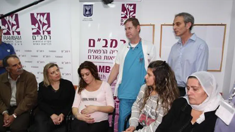 Sarah Netanyahu with the families