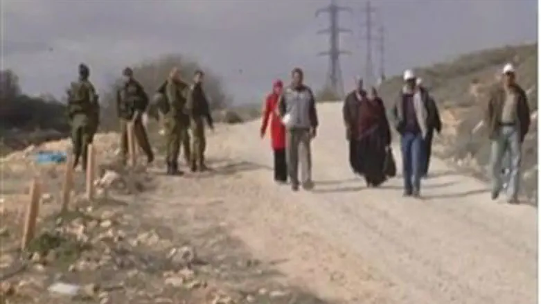 Arabs and Soldiers Near Netzer