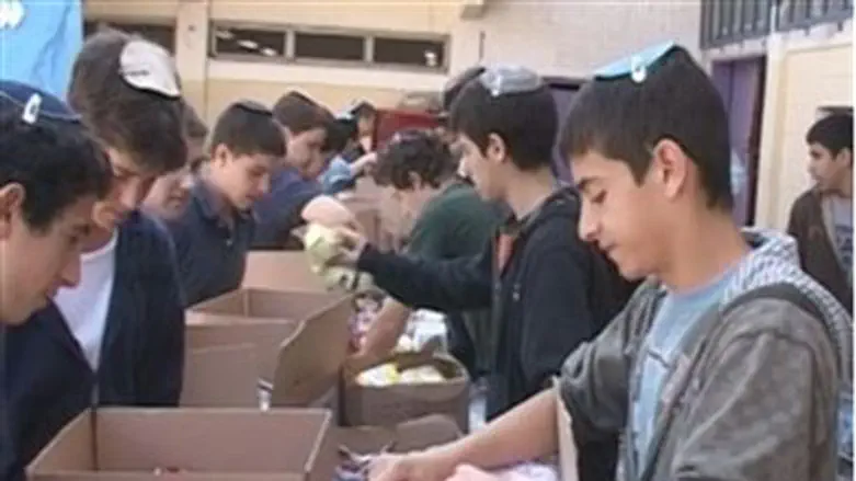 Students pack for the needy