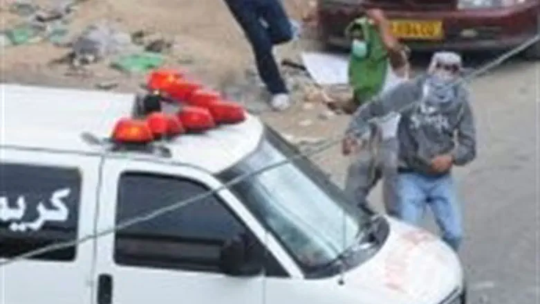 Arabs use ambulance for cover.