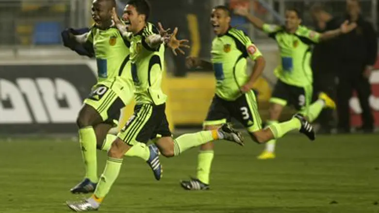 Beitar players celebrate a win