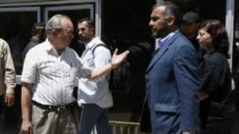 Goldstone (left) with Hamas representative