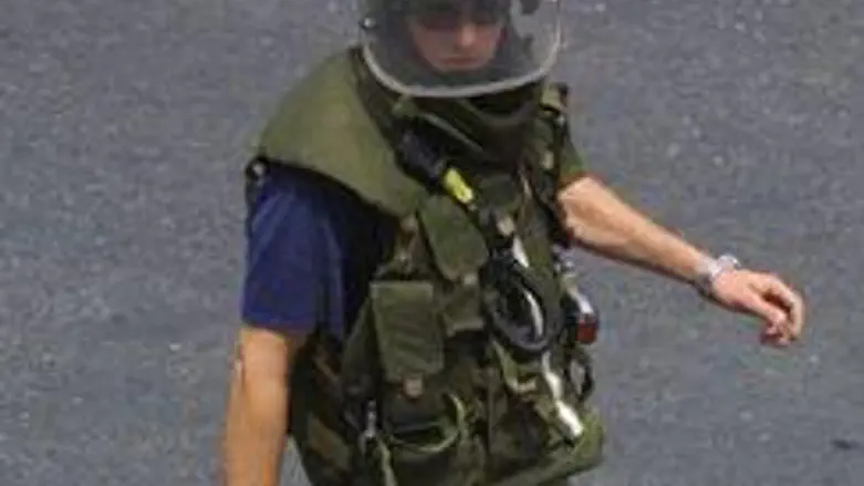 Police sapper prepares to defuse the bombs