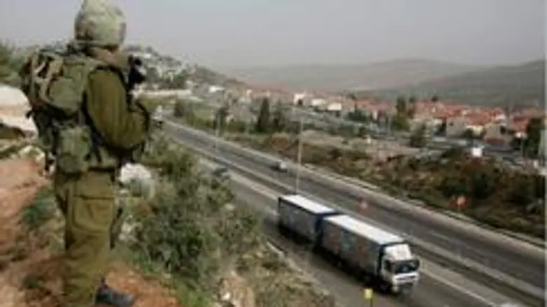 Soldier overlooks Route 443