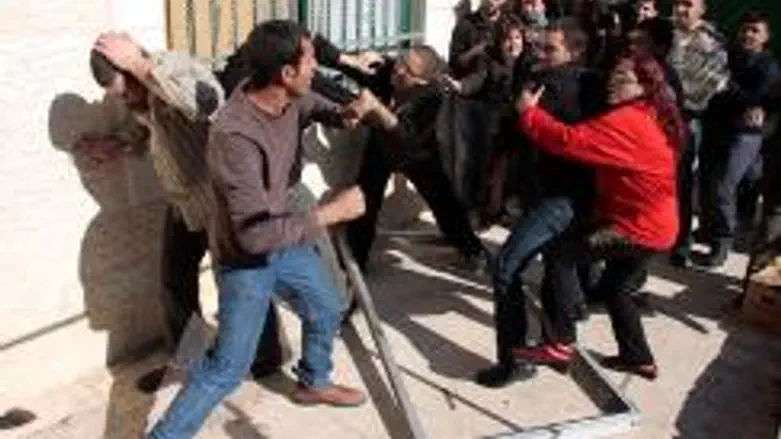 Arabs and foreign leftists clash with Jews