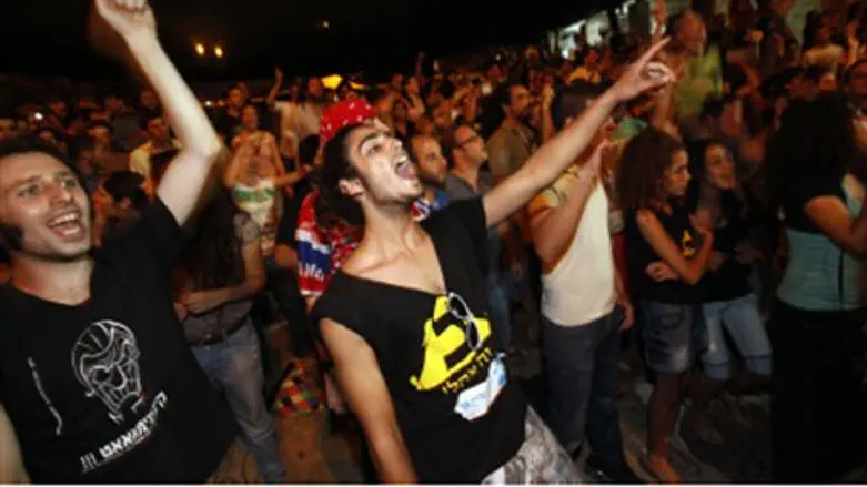 Protesters dance at rock show.