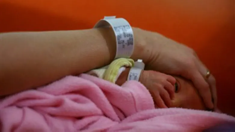 Newborn baby and mother.