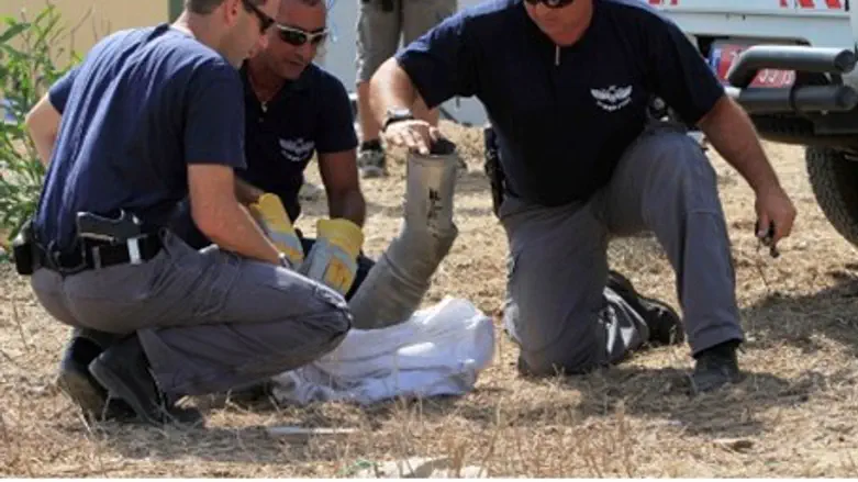 Security officials inspect Kassam in Ashkelon
