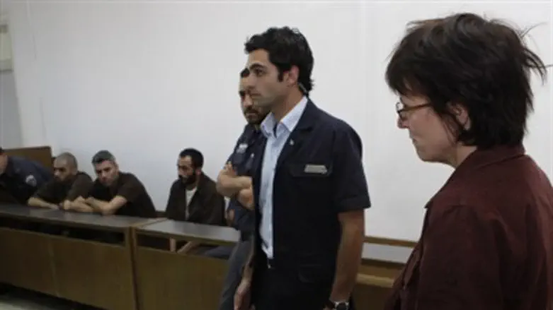 Wilson faces the attackers.