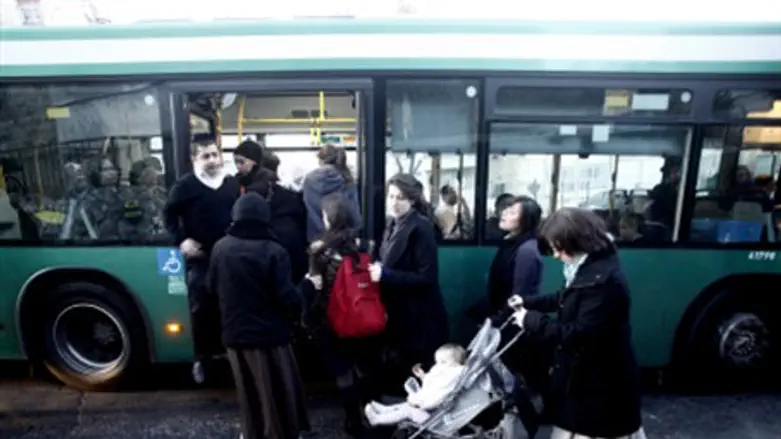 Women boarding bus.